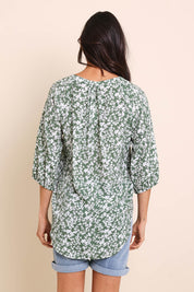 Model Amandam wearing size 10 of the The Every Wear Shirt  - Greenwhite in colour Greenwhite, from the back