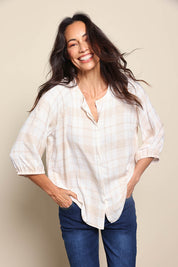 Model Amandam wearing size 10 of the The Every Wear Shirt – Ivorysand in colour Ivorysand, in a cropped view
