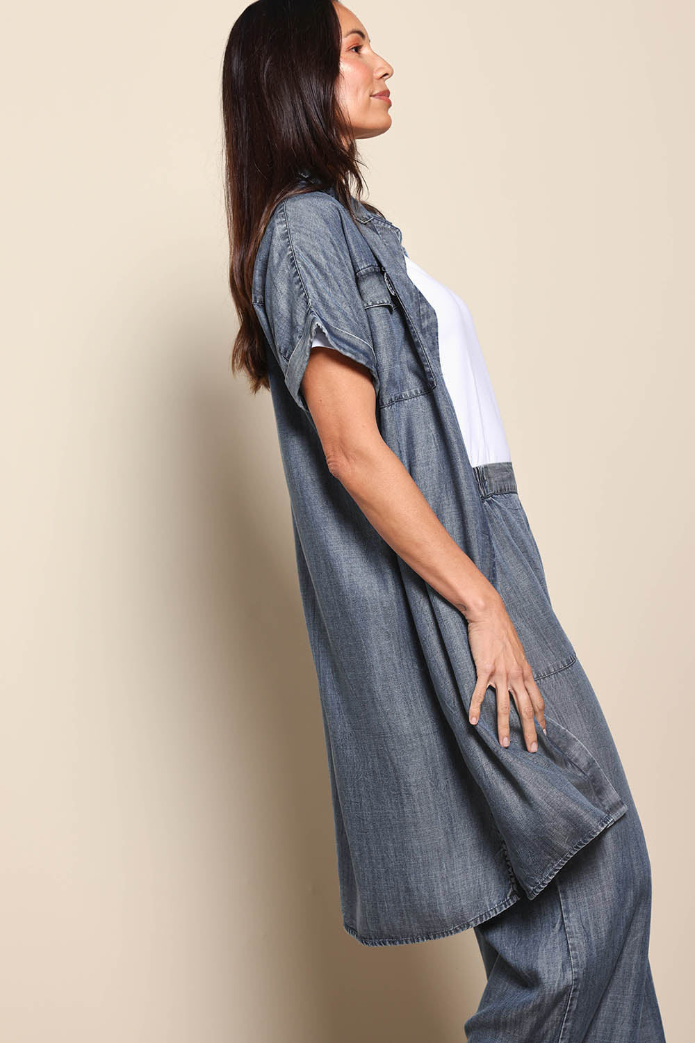 Model Amandam wearing size 10 of the The Luxe Lyocell Shacket Dress – Indigo in colour Indigo, from an angle