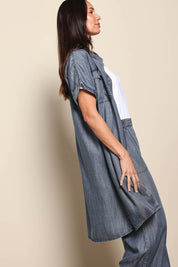 Model Amandam wearing size 10 of the The Luxe Lyocell Shacket Dress – Indigo in colour Indigo, from an angle