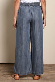 Model Amandam wearing size 10 of the The Luxe Lyocell Pull On Wide Leg Pant – Indigo in colour Indigo, from the front