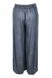 Product shot of the The Luxe Lyocell Pull On Wide Leg Pant – Indigo in colour Indigo, from the back