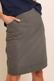 Model Amandam wearing size 10 of the The Lightweight Cotton Blend Stretch Skirt – Olive in colour Olive, in a cropped view