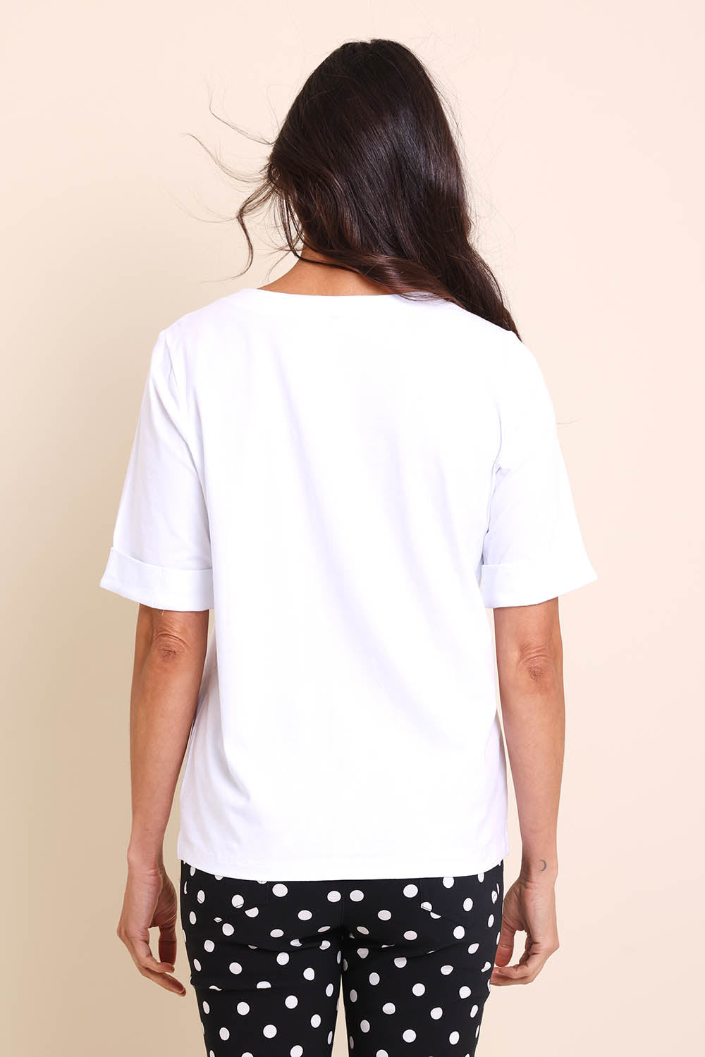 Model Amandam wearing size 10 of the The Keepers Relaxed Fit Tee – White in colour White, from the back