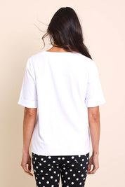 Model Amandam wearing size 10 of the The Keepers Relaxed Fit Tee – White in colour White, from the back
