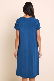 Model Amandam wearing size 10 of the The Easy Wear Bamboo Tee Dress – Marine in colour Marine, from the back