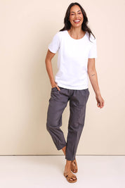 Model Amandam wearing size 10 of the The Lightweight Cotton Blend Pintuck Hem Pant – Gravel in colour Gravel, from the front