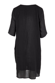 Product shot of the The Summer Cotton Shift Dress With Pockets – Ink in colour Ink, from the back