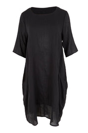 Product shot of the The Summer Cotton Shift Dress With Pockets – Ink in colour Ink, from the front