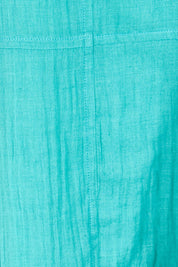 Product shot of the The Summer Cotton Shift Dress With Pockets – Lagoon in colour Lagoon, showing detail