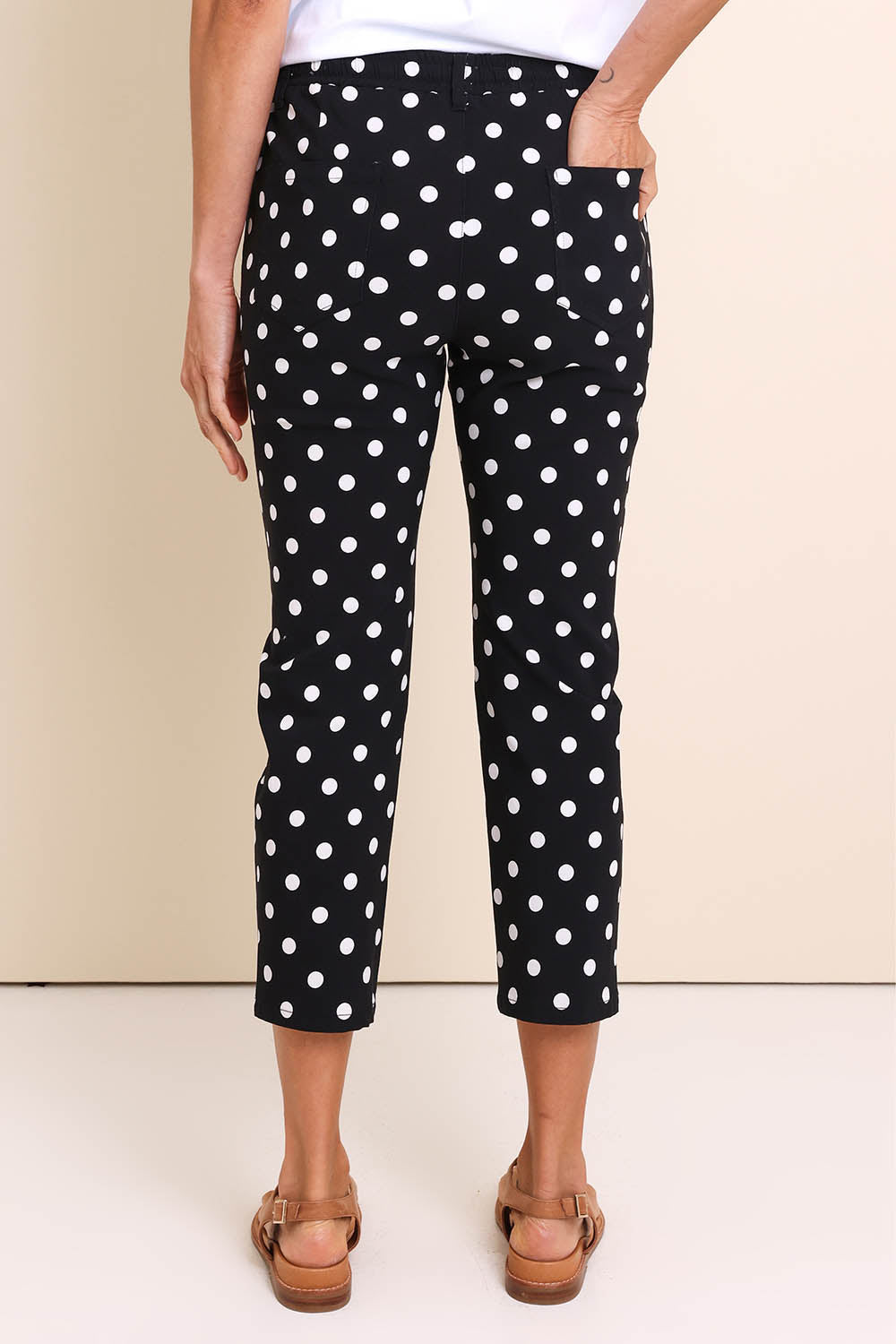 Model Amandam wearing size 10 of the The Summer Cropped Pant - Blackwhite in colour Blackwhite, from the back