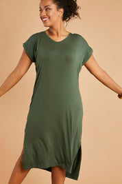 Model Noli wearing size 14 of The Mid Length Tee Dress in colour Khaki (Green), from the front, showing the whole outfit