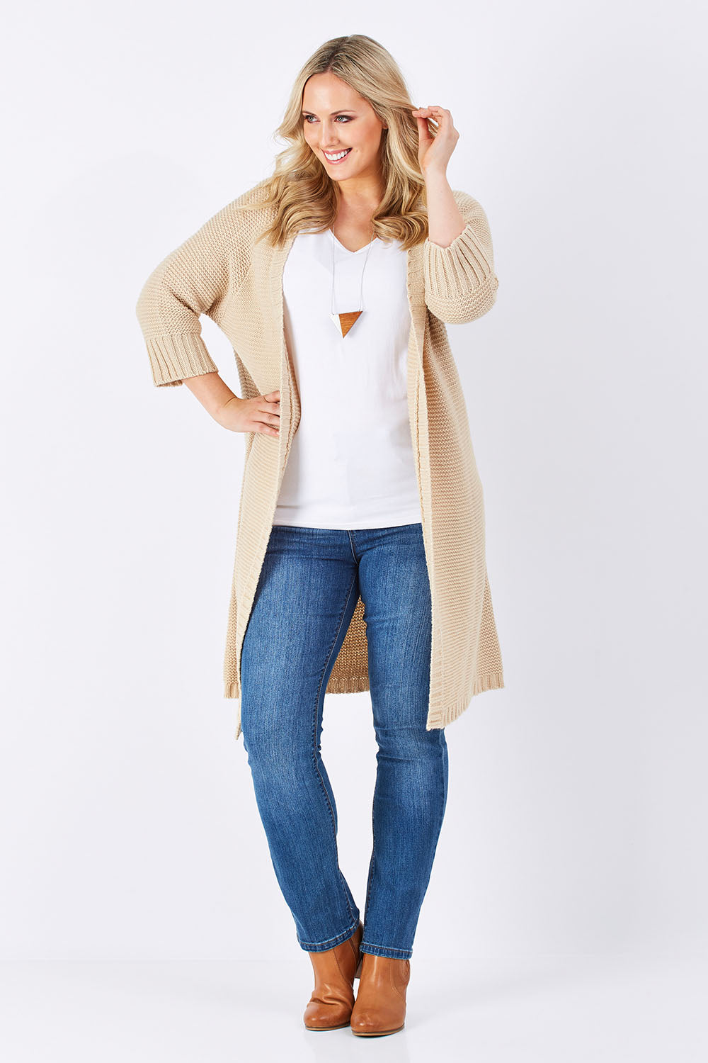 Model Jess wearing size L of The Half Sleeve Cardigan in colour Oatmeal, from the front, showing the whole outfit