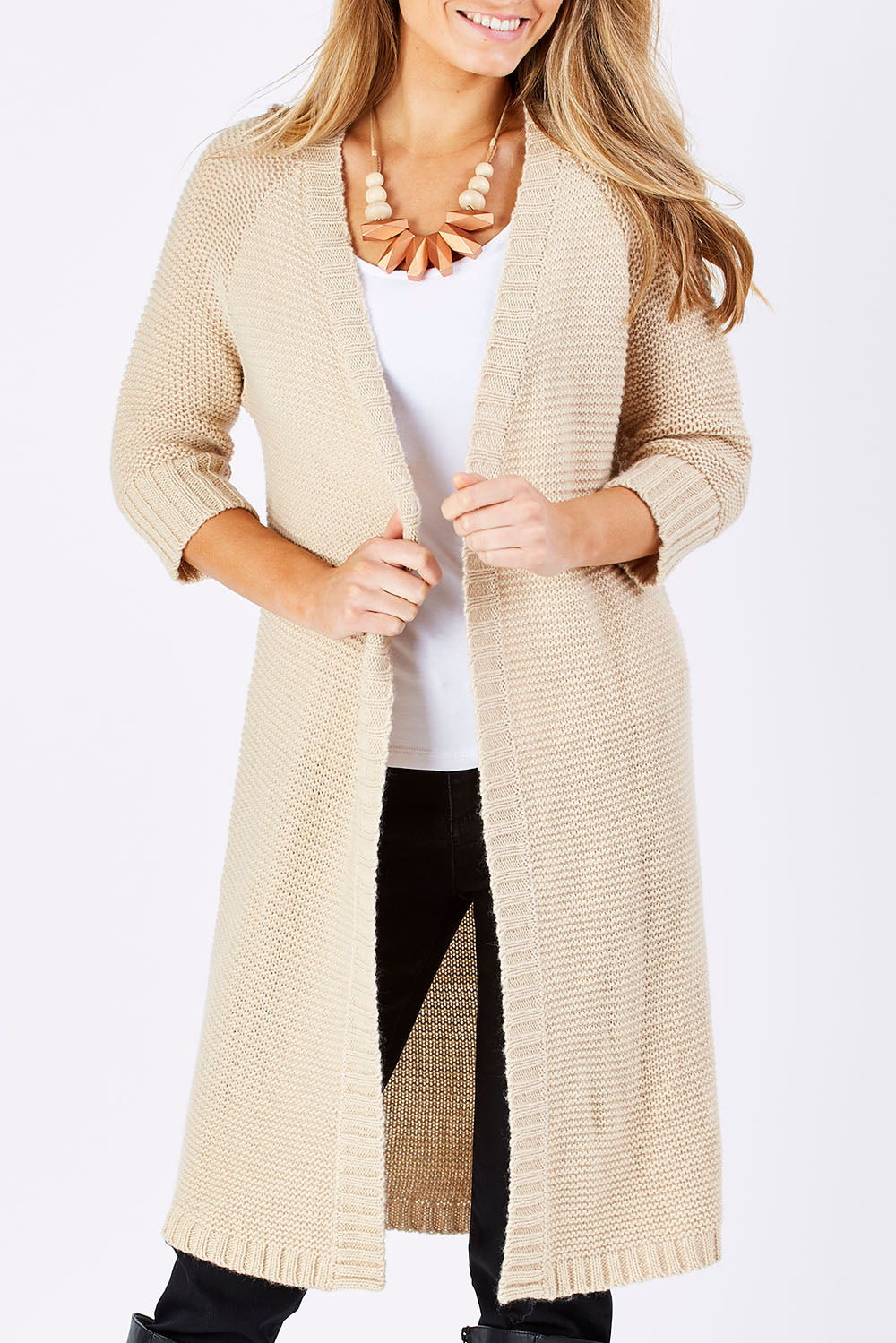 Model Marnee wearing size S of The Half Sleeve Cardigan in colour Oatmeal, from the front, cropped image