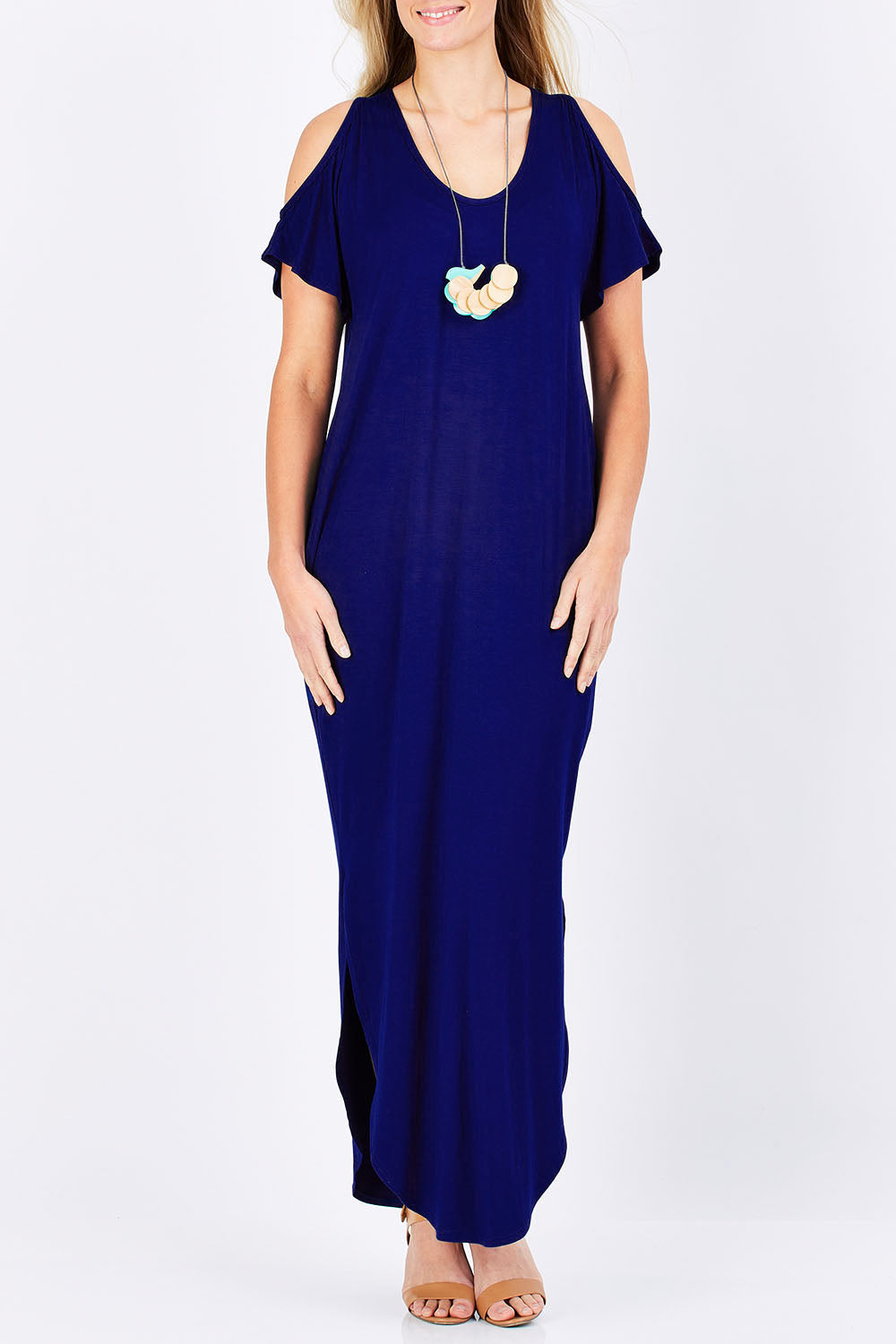 Model Maddy wearing size 10 of The Shoulder Splice Maxi Dress in colour Sapphire (Blue), from the front, cropped image