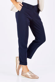Model Marnee wearing size 10 of The Soft Ankle Grazer Pant in colour Navy (Blue), from the front, showing the whole outfit