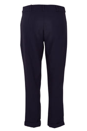 Product shot of The Soft Ankle Grazer Pant in colour Navy (Blue), from the back