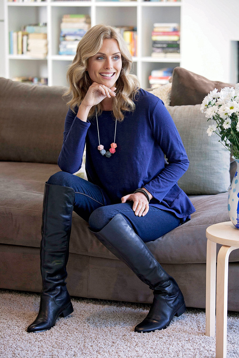 Model Natalie wearing size 8 of The Long Sleeve Swing Tee in colour DenimBlue (Blue), from the front, showing the whole outfit