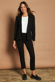 Model Madeline wearing size 10 of The Ponte Blazer in colour Black (Black), from the front, showing the whole outfit
