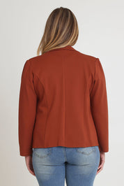 Model Chanel wearing size 16 of The Ponte Blazer in colour Ochre, from the back