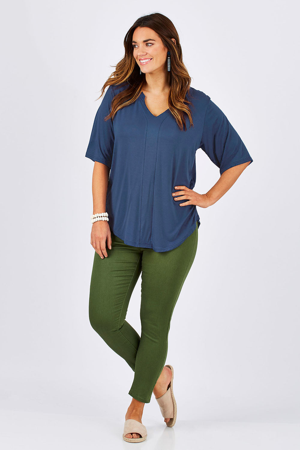 Model Laura wearing size 12 of The Stella Tee in colour Blue (Blue), from the front, showing the whole outfit