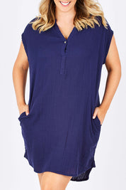 Model Jess wearing size 14 of The Bonded Cotton Dress in colour FrenchNavy (Blue), from the front, cropped image