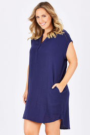 Model Jess wearing size 14 of The Bonded Cotton Dress in colour FrenchNavy (Blue), from the front, cropped image