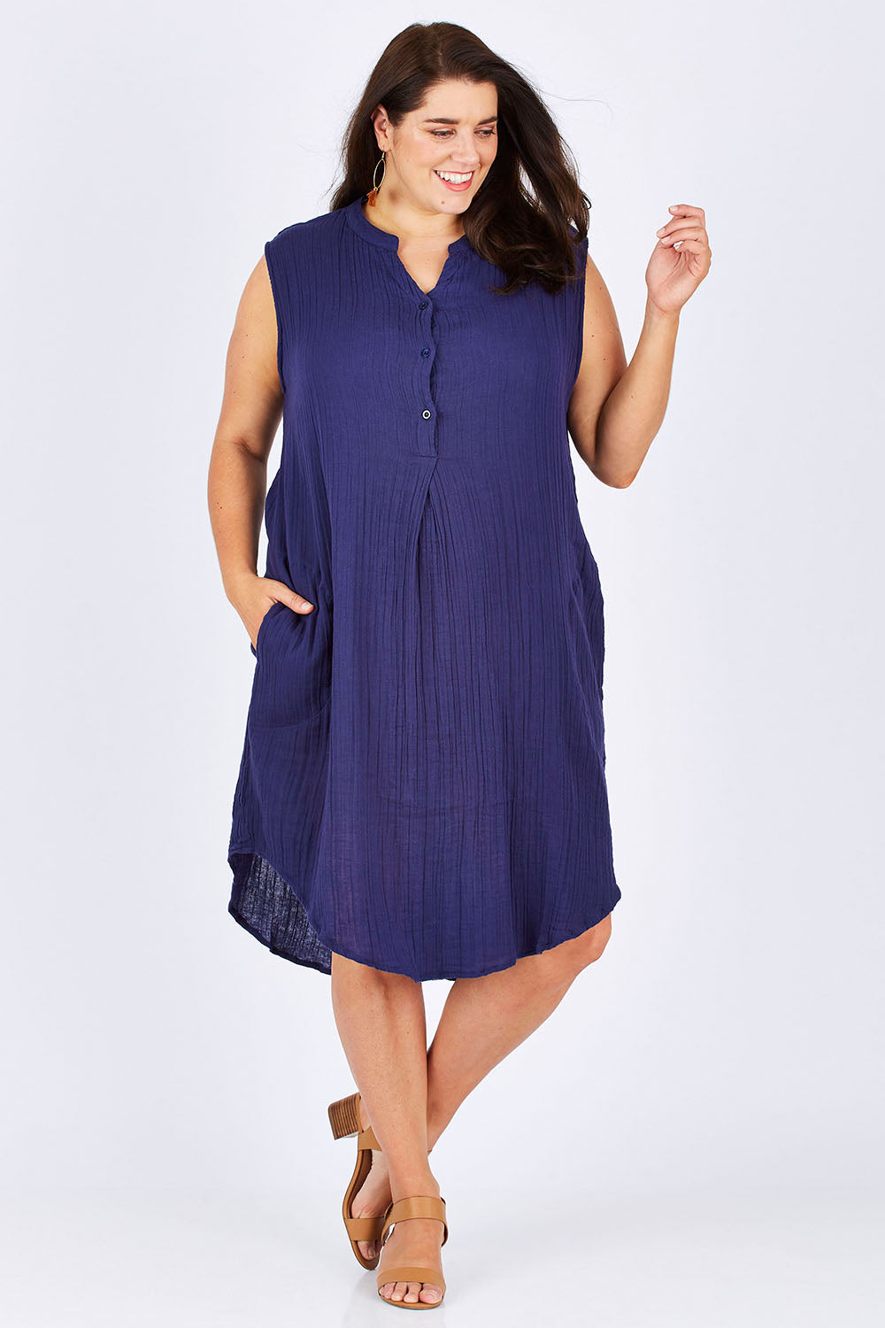Model Mae wearing size 18 of The Bonded Cotton Dress in colour FrenchNavy (Blue), from the front, showing the whole outfit