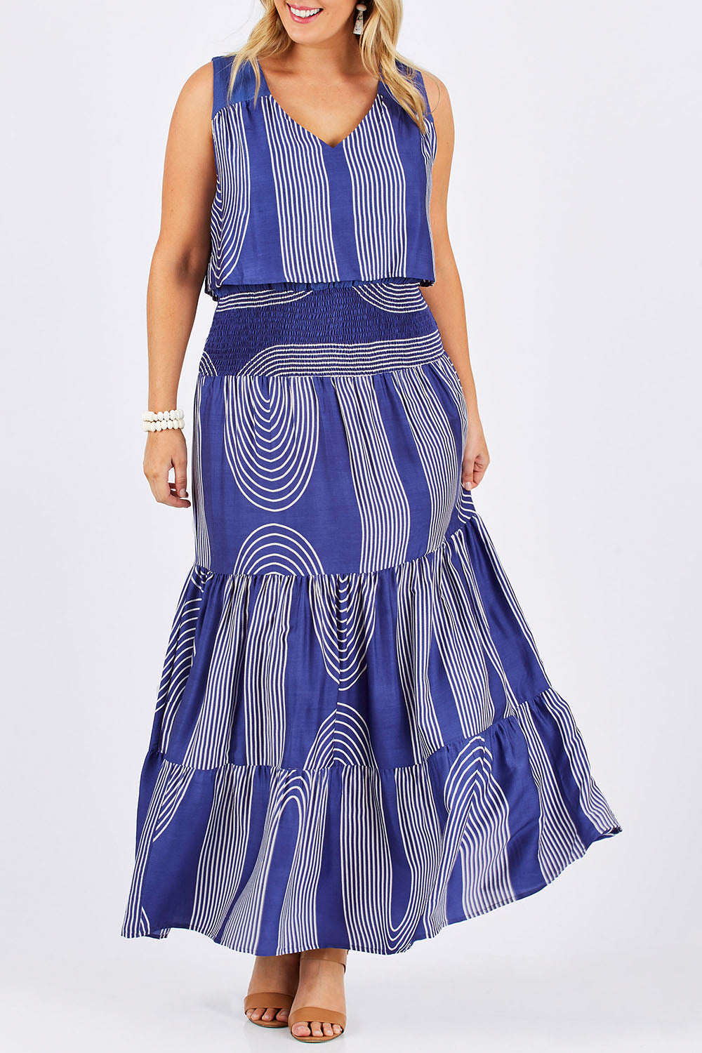 Model Jess wearing size 12 of The Curve Striped Maxi Dress in colour Marine (Blue), from the front, cropped image
