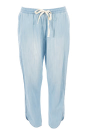 Product shot of The Chambray Curved Hem Pant in colour Chambray (Blue), from the front