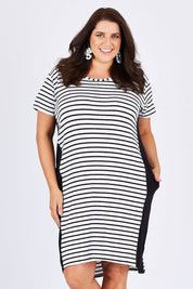Model Mae wearing size 18 of The Contrast Panel Dress in colour Blkstripe (Black), from the front, cropped image