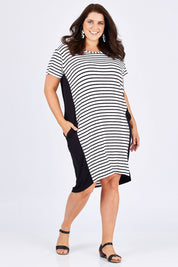 Model Mae wearing size 18 of The Contrast Panel Dress in colour Blkstripe (Black), from the front, showing the whole outfit
