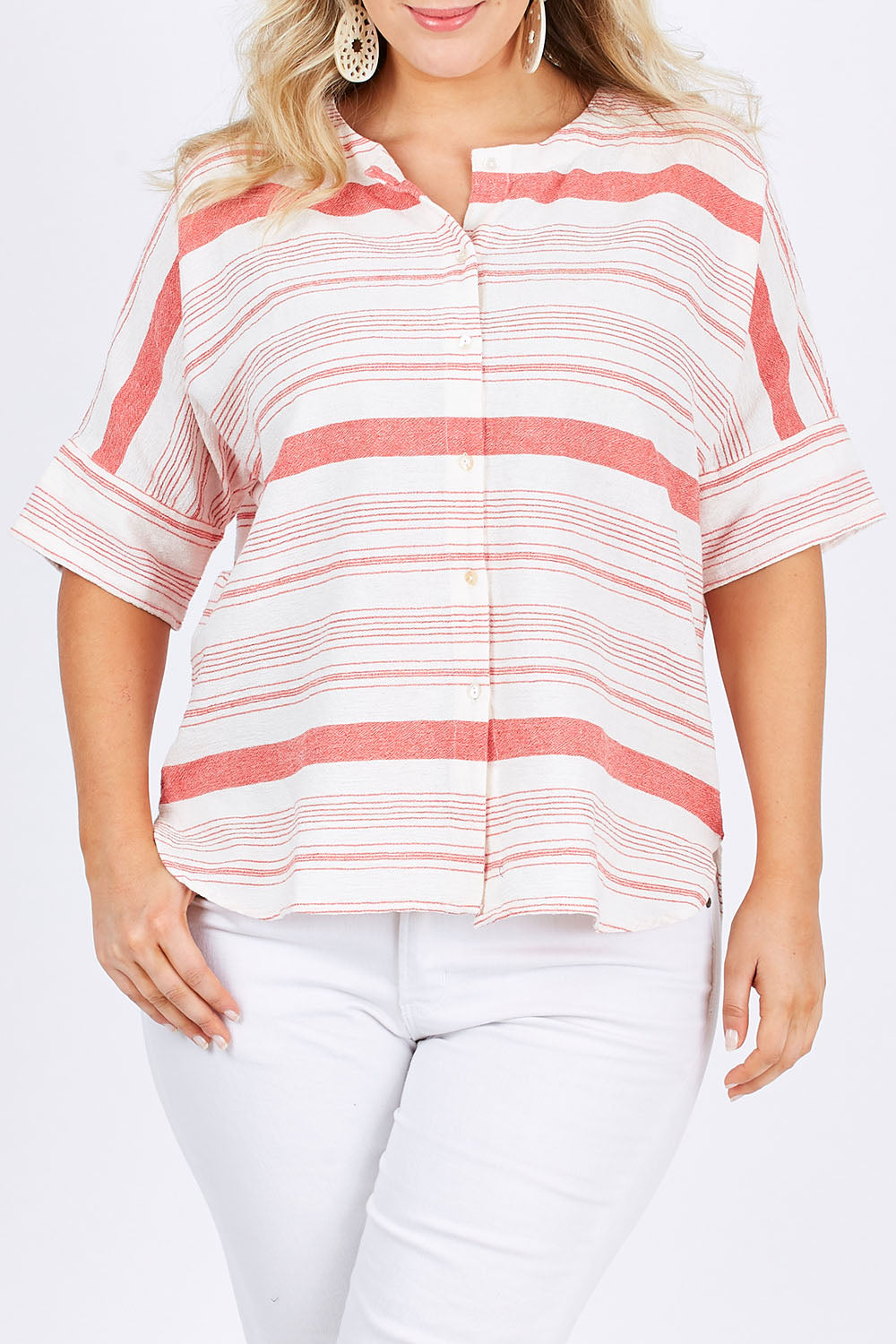 Model Jess wearing size 14 of The Stripe Button Through Top in colour Coral (Pink), from the front, cropped image