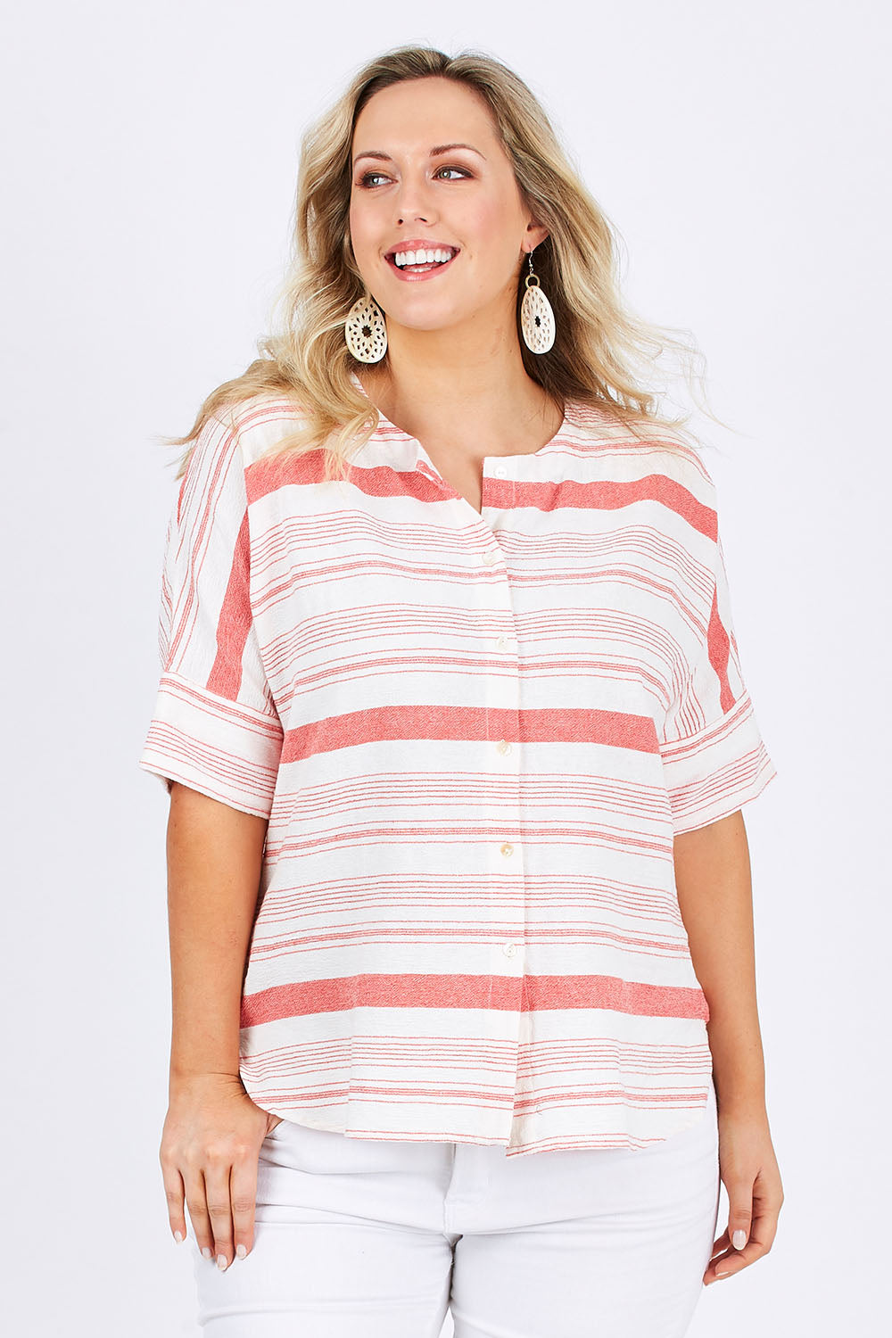 Model Jess wearing size 14 of The Stripe Button Through Top in colour Coral (Pink), from the front, cropped image