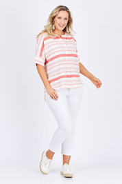 Model Jess wearing size 14 of The Stripe Button Through Top in colour Coral (Pink), from the front, showing the whole outfit