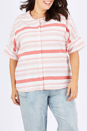Model Mae wearing size 18 of The Stripe Button Through Top in colour Coral (Pink), from the front, cropped image