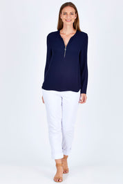 Model Riina wearing size 10 of The Zip Front Blouse in colour Navy (Blue), from the front, showing the whole outfit
