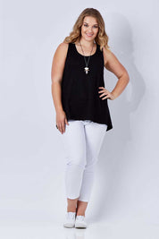 Model Kate wearing size 16 of The Pintuck Back Tank in colour Black (Black), from the front, showing the whole outfit