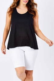 Model Laura wearing size 12 of The Pintuck Back Tank in colour Black (Black), from the front, cropped image