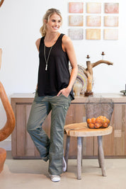 Model Natalie wearing size 8 of The Pintuck Back Tank in colour Black (Black), from the front, showing the whole outfit