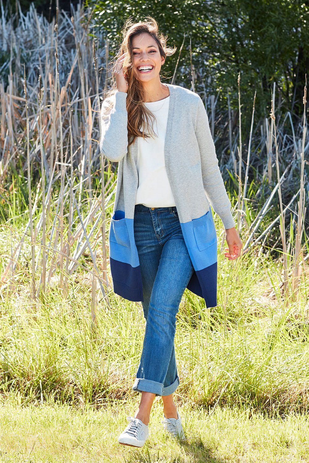 Model Amanda wearing size S of The Cosy Cardigan in colour Blue (Blue), from the front, showing the whole outfit