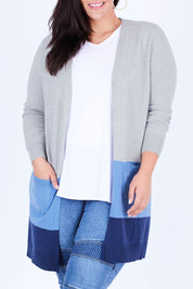 Model Lauren wearing size XL of The Cosy Cardigan in colour Blue (Blue), from the front, cropped image