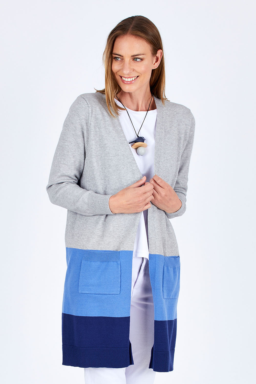 Model Riina wearing size S of The Cosy Cardigan in colour Blue (Blue), from the front, cropped image