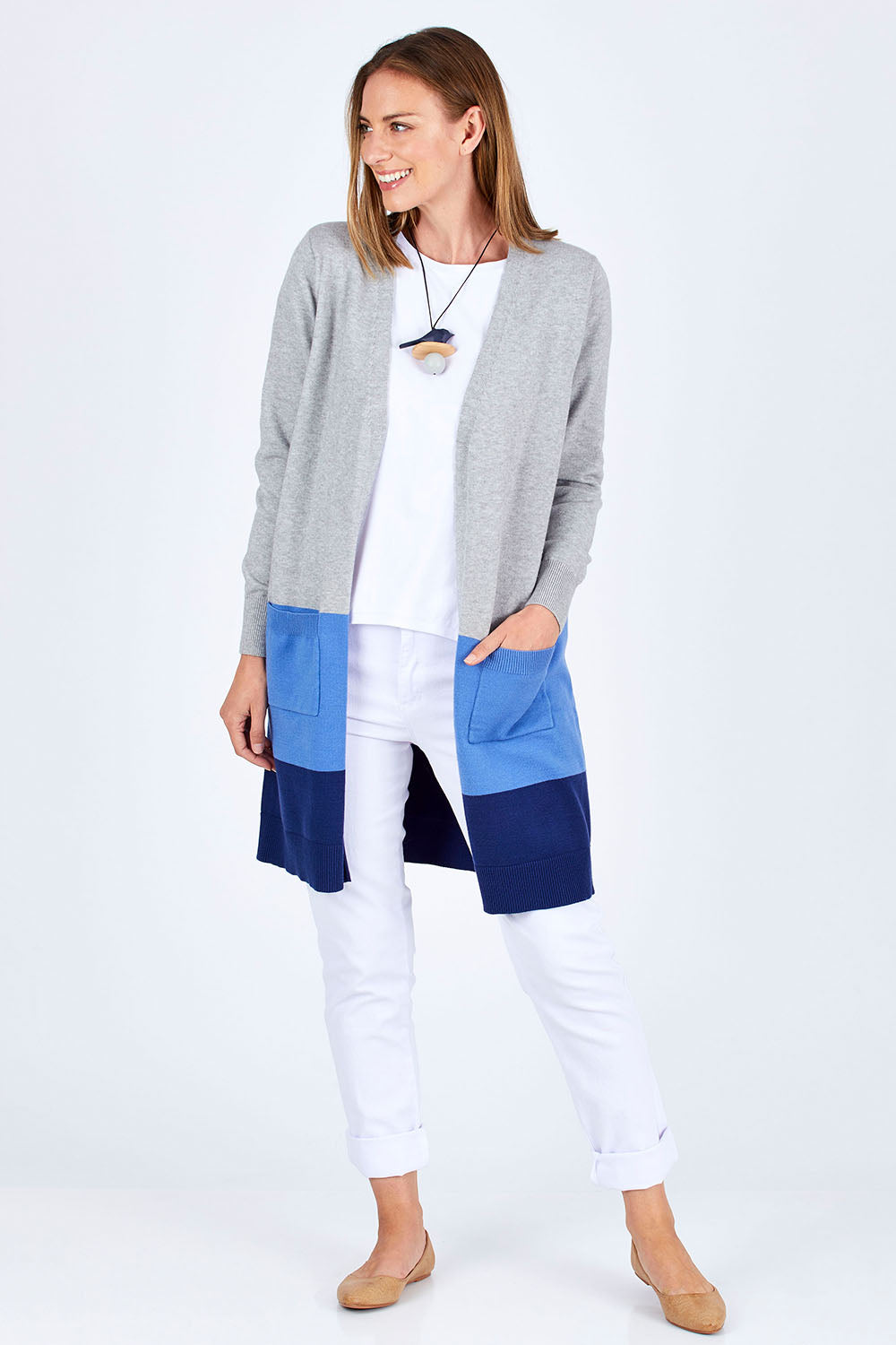 Model Riina wearing size S of The Cosy Cardigan in colour Blue (Blue), from the front, showing the whole outfit