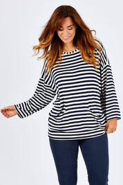 Model Laura wearing size 12 of The Slouch Pocket Tee in colour Stripe (Blue), from the front, cropped image