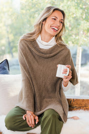 Model Amanda wearing size S of The Perfect Poncho in colour Natural, from the front, showing the whole outfit