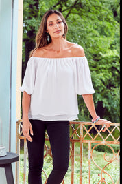 Model Amanda wearing size 10 of The Double Layer Top in colour White (White), from the front, showing the whole outfit