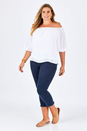 Model Fiona wearing size 16 of The Double Layer Top in colour White (White), from the front, showing the whole outfit