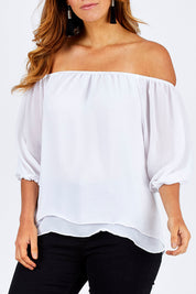 Model Laura wearing size 12 of The Double Layer Top in colour White (White), from the front, cropped image