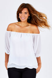 Model Laura wearing size 12 of The Double Layer Top in colour White (White), from the front, cropped image
